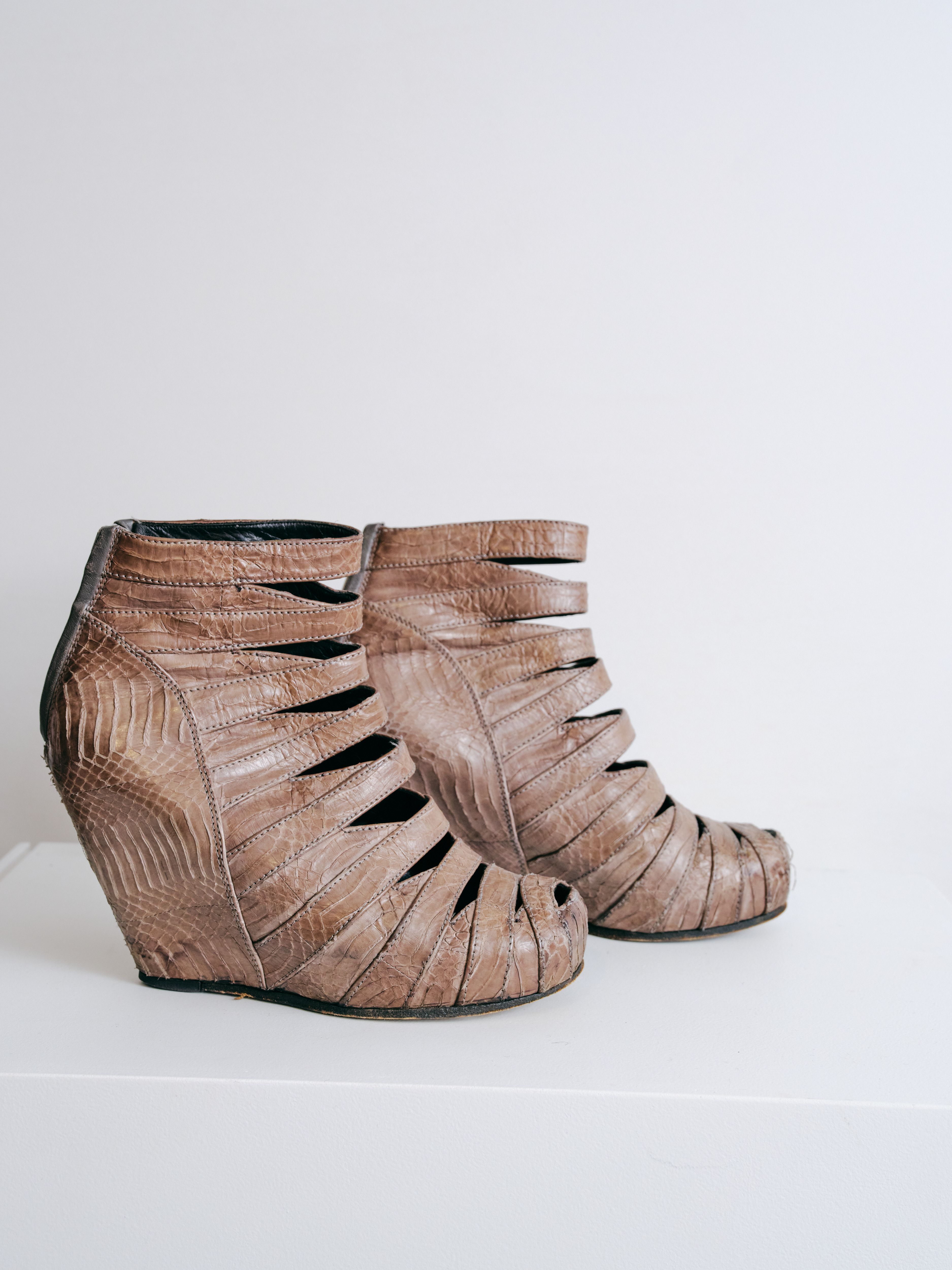 snakeskin wedge boots